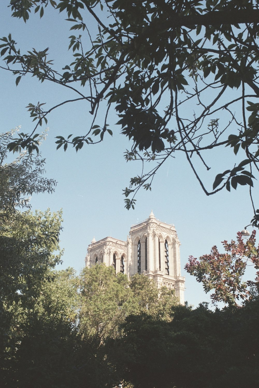 a tall building with a clock on the top of it