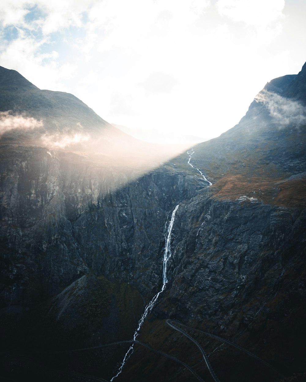 a mountain with a river running through it