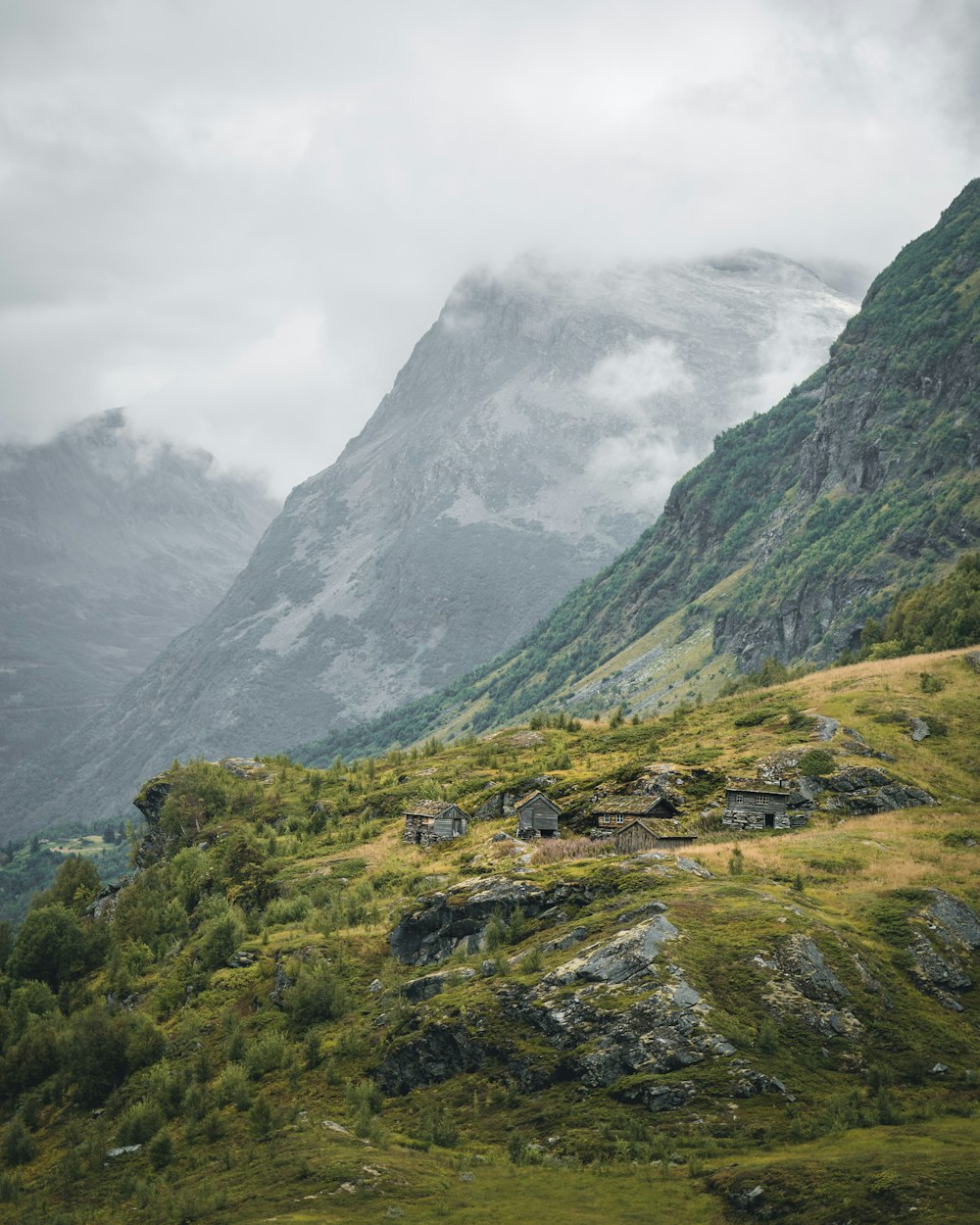 a view of a mountain range with a cloudy sky