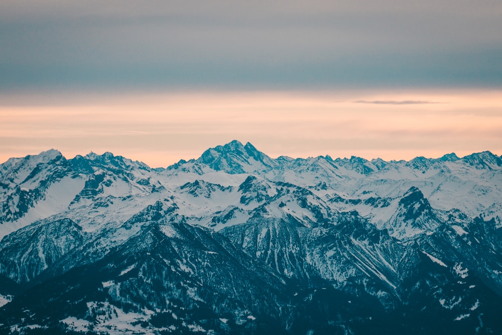 a view of a mountain range at sunset