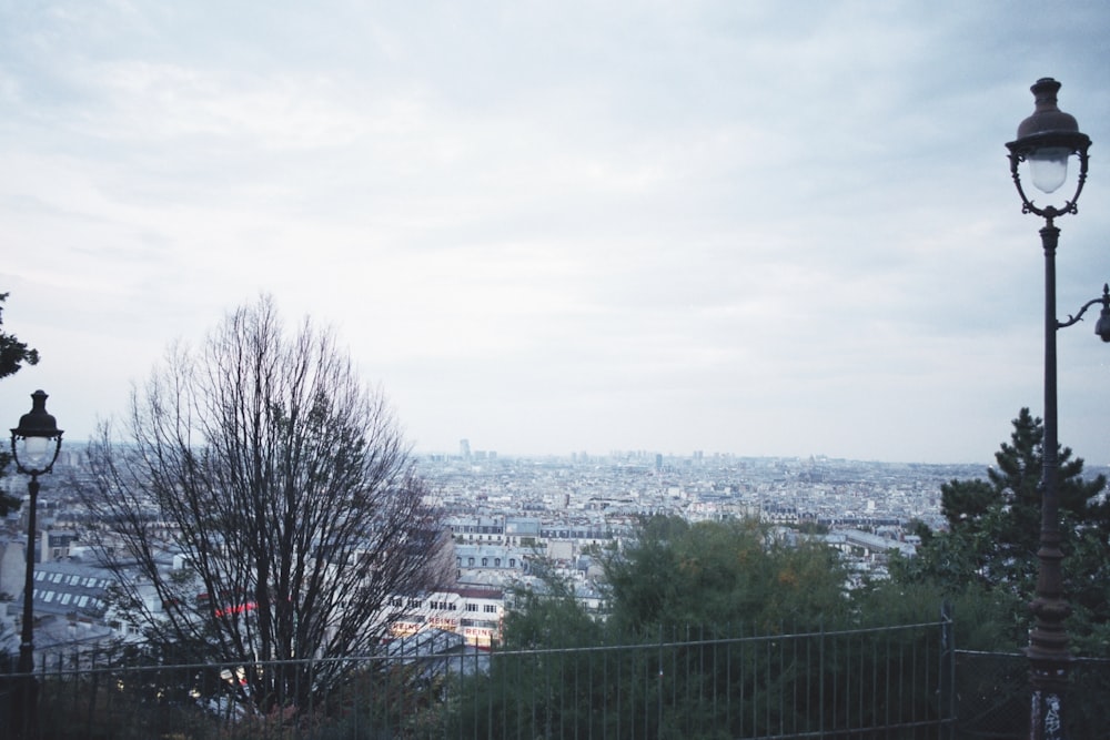 a view of a city from a hill