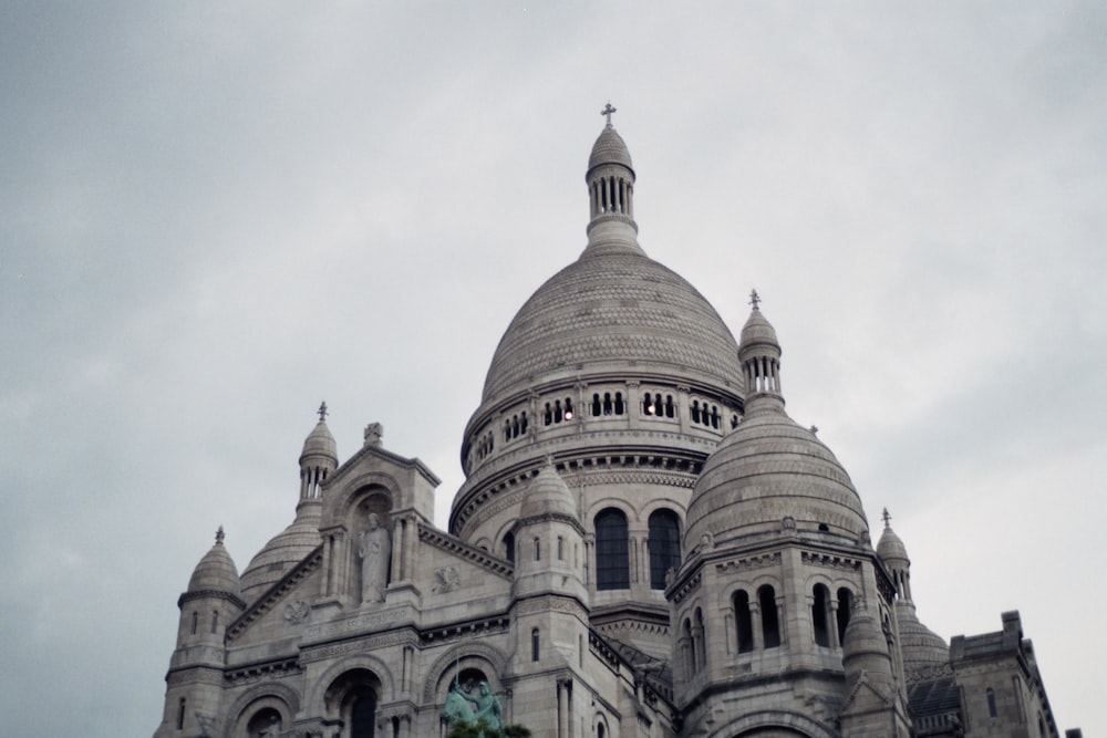 a large cathedral with a clock on the front of it