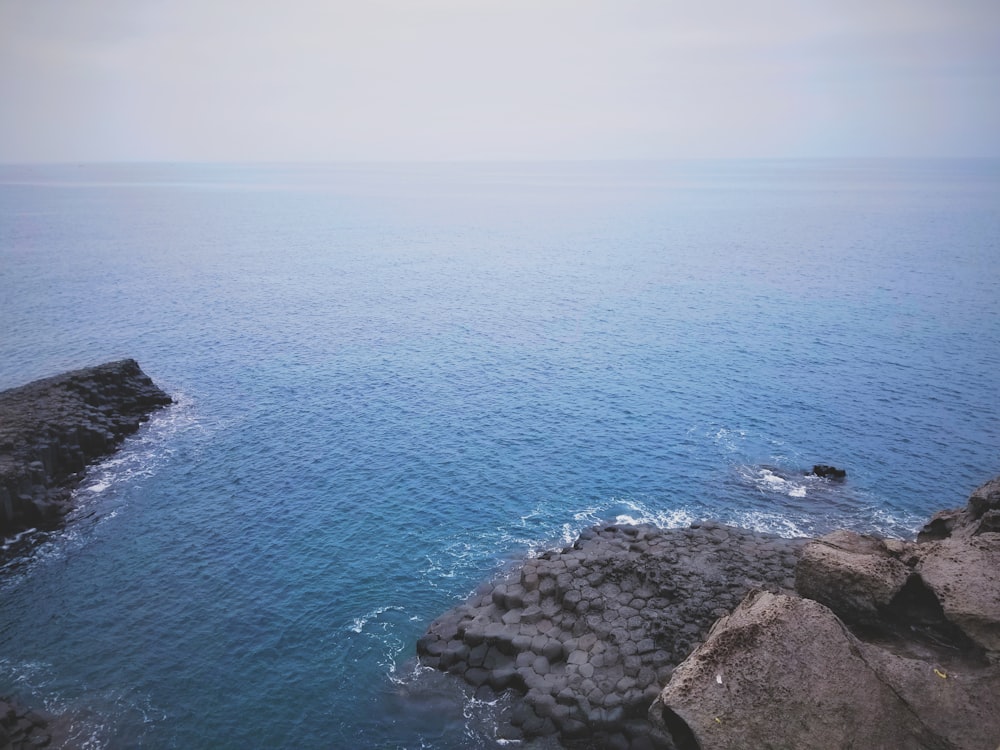 a view of the ocean from a cliff