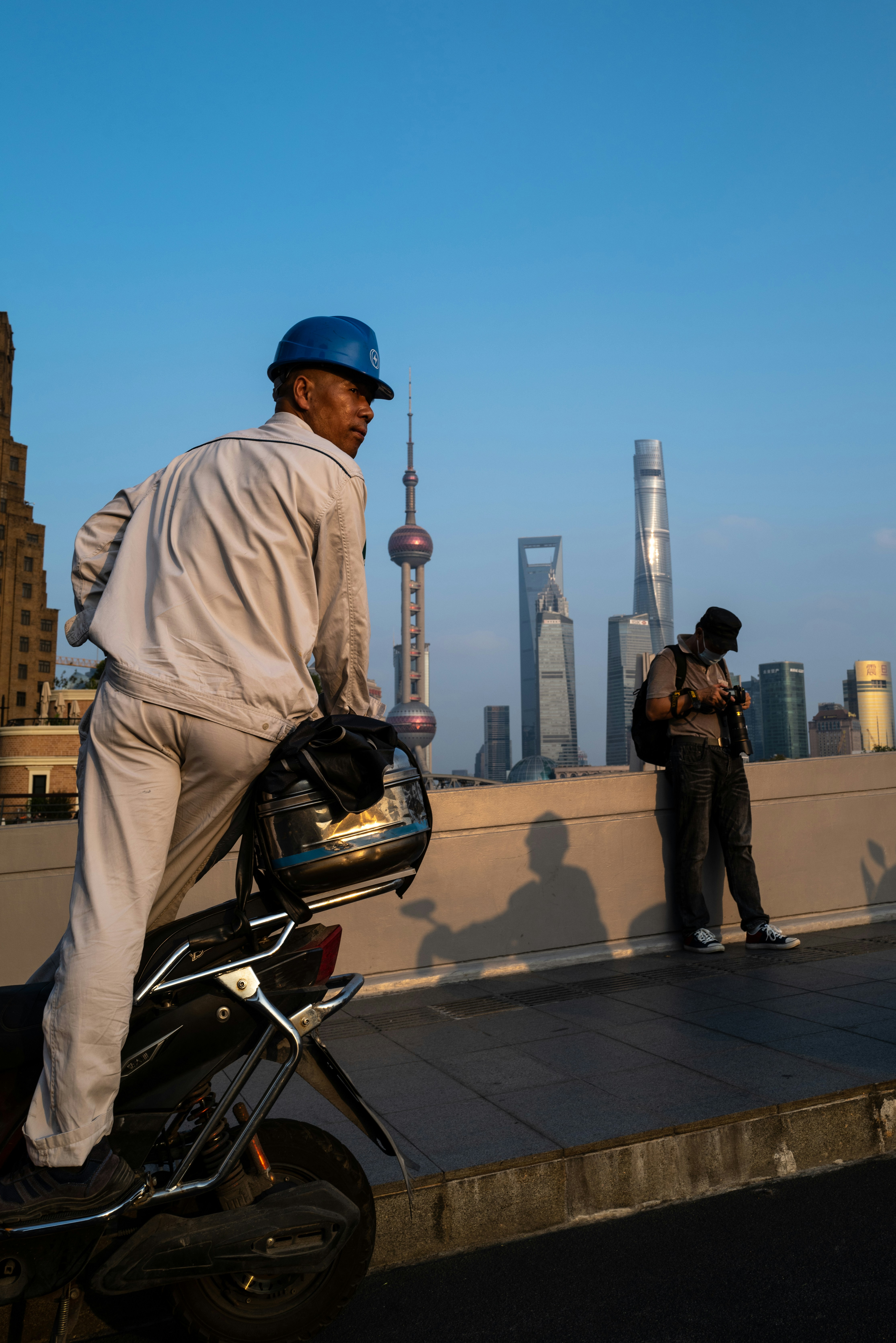 A man riding on the back of a motorcycle photo – Free Human Image on ...