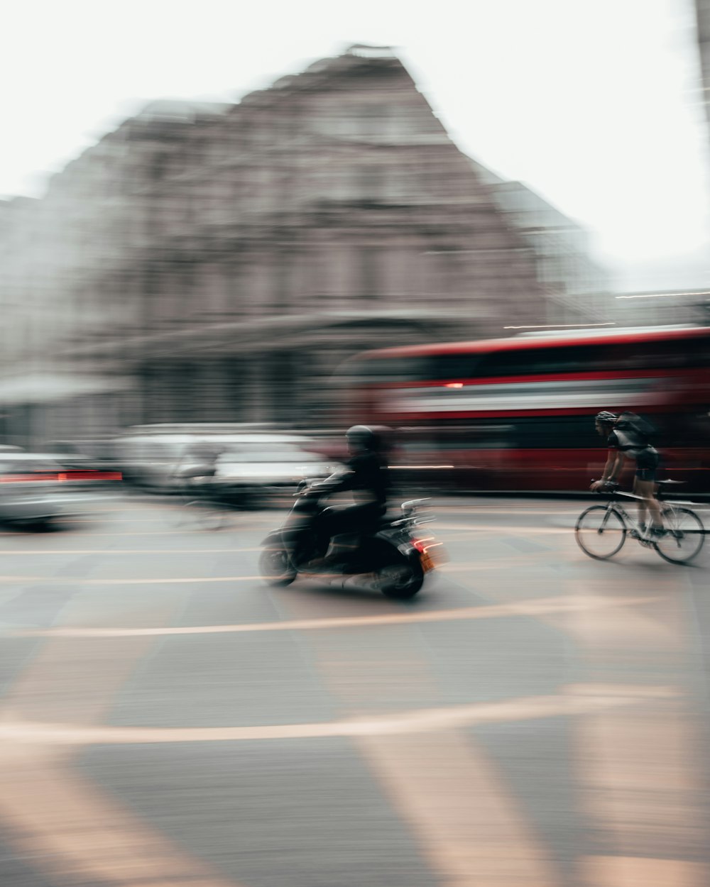 a blurry photo of a person riding a motorcycle