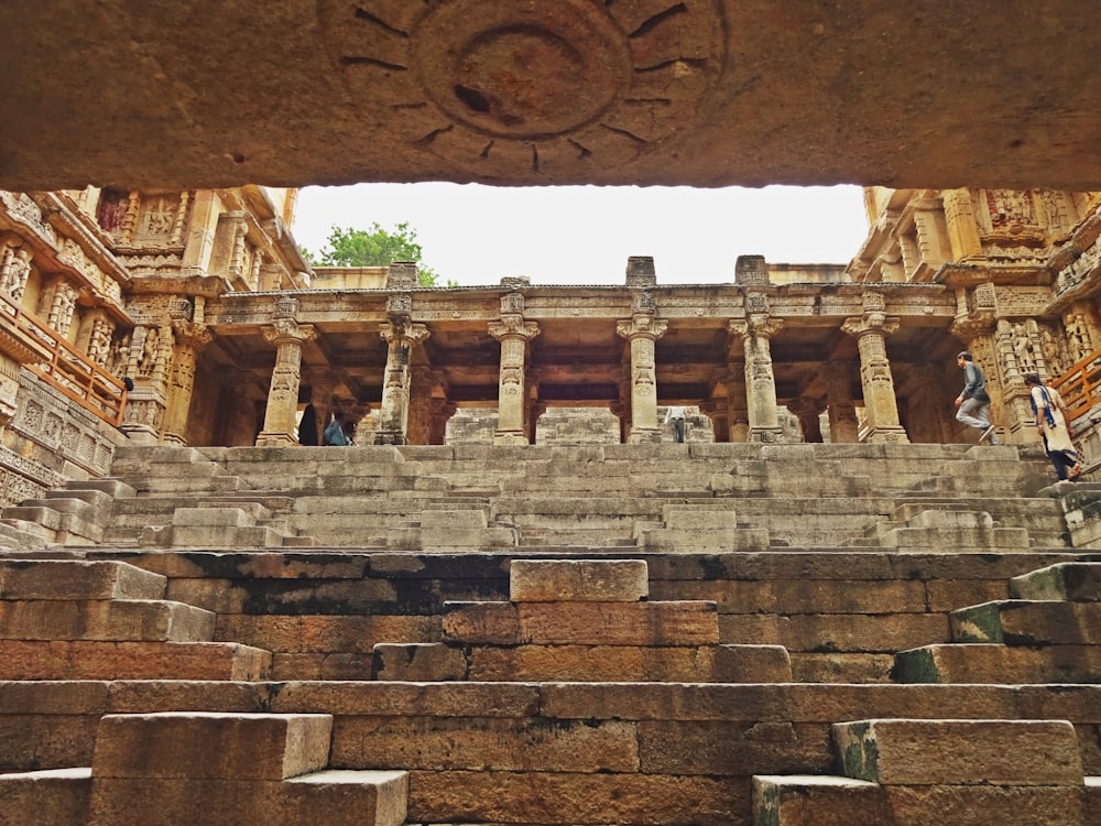 a group of stone steps leading up to a building