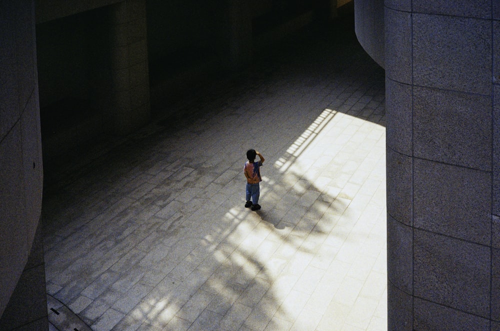 a person walking down a sidewalk