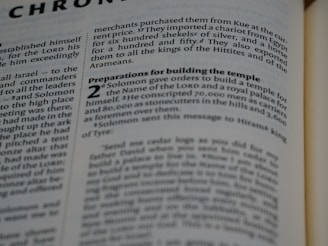 A page from a book with text related to biblical content, specifically mentioning Solomon and preparations for building a temple. The page includes a heading in bold and a section marked with the number 2. The text is in black font on a white background, with some parts highlighted in bold for emphasis.