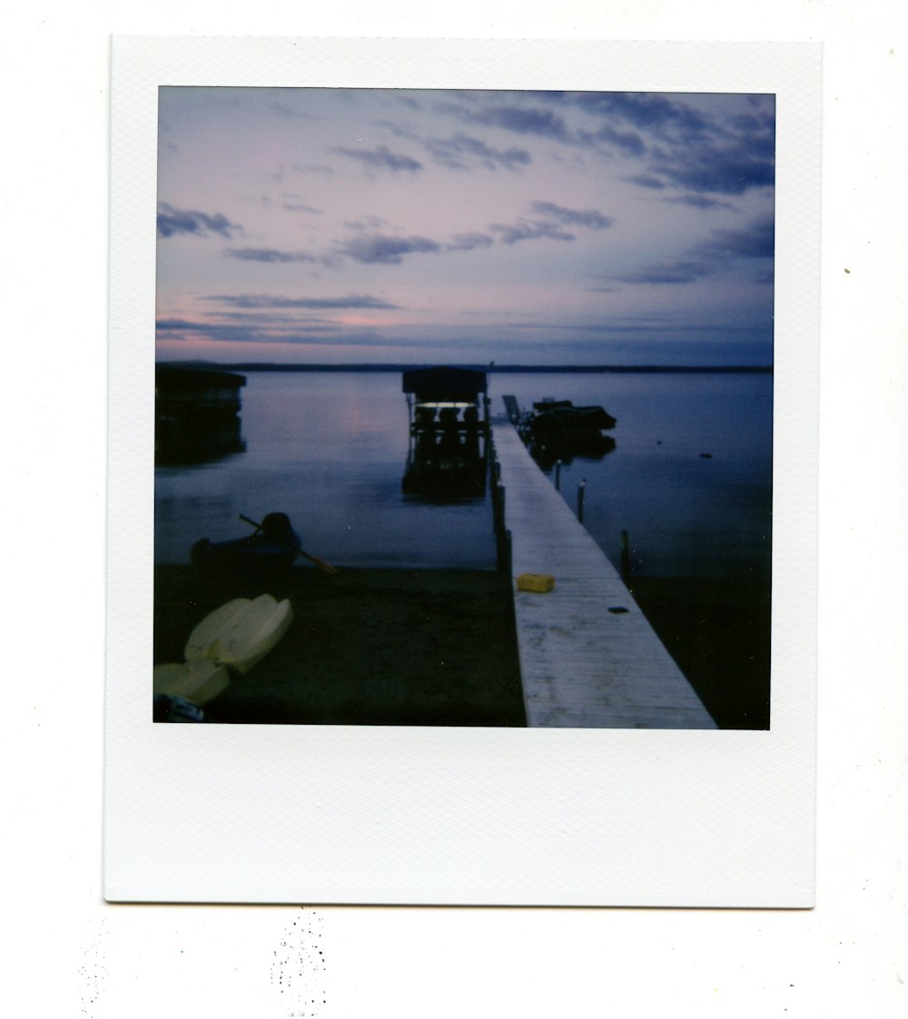 a picture of a boat docked at a pier