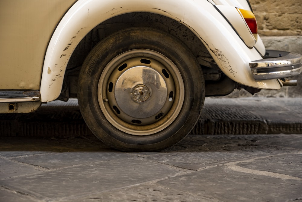 a close up of a white truck tire
