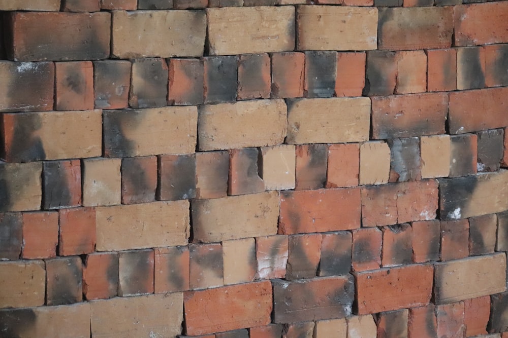 a close up of a brick wall made of bricks