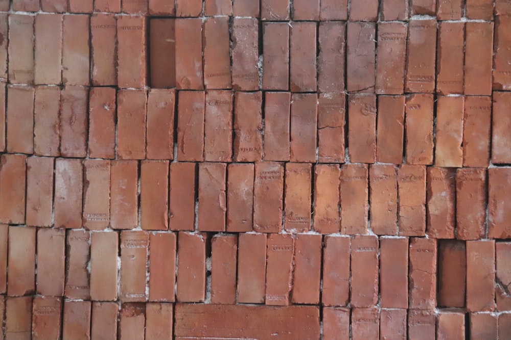 a close up of a brick wall made of bricks