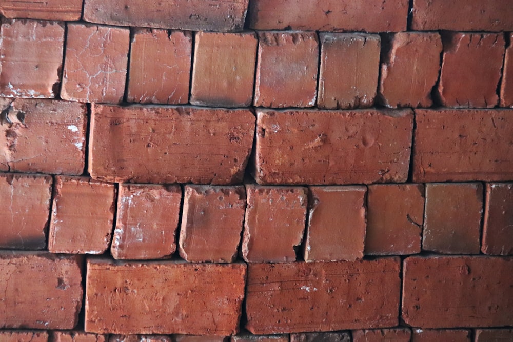 a close up of a brick wall made of bricks