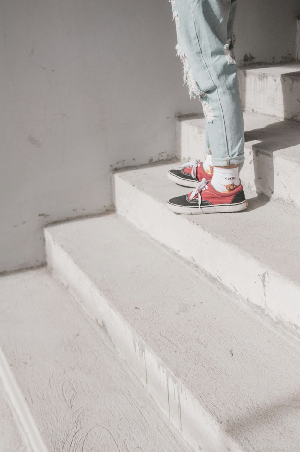 a person walking up a set of stairs