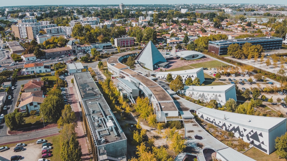 an aerial view of a city with many buildings