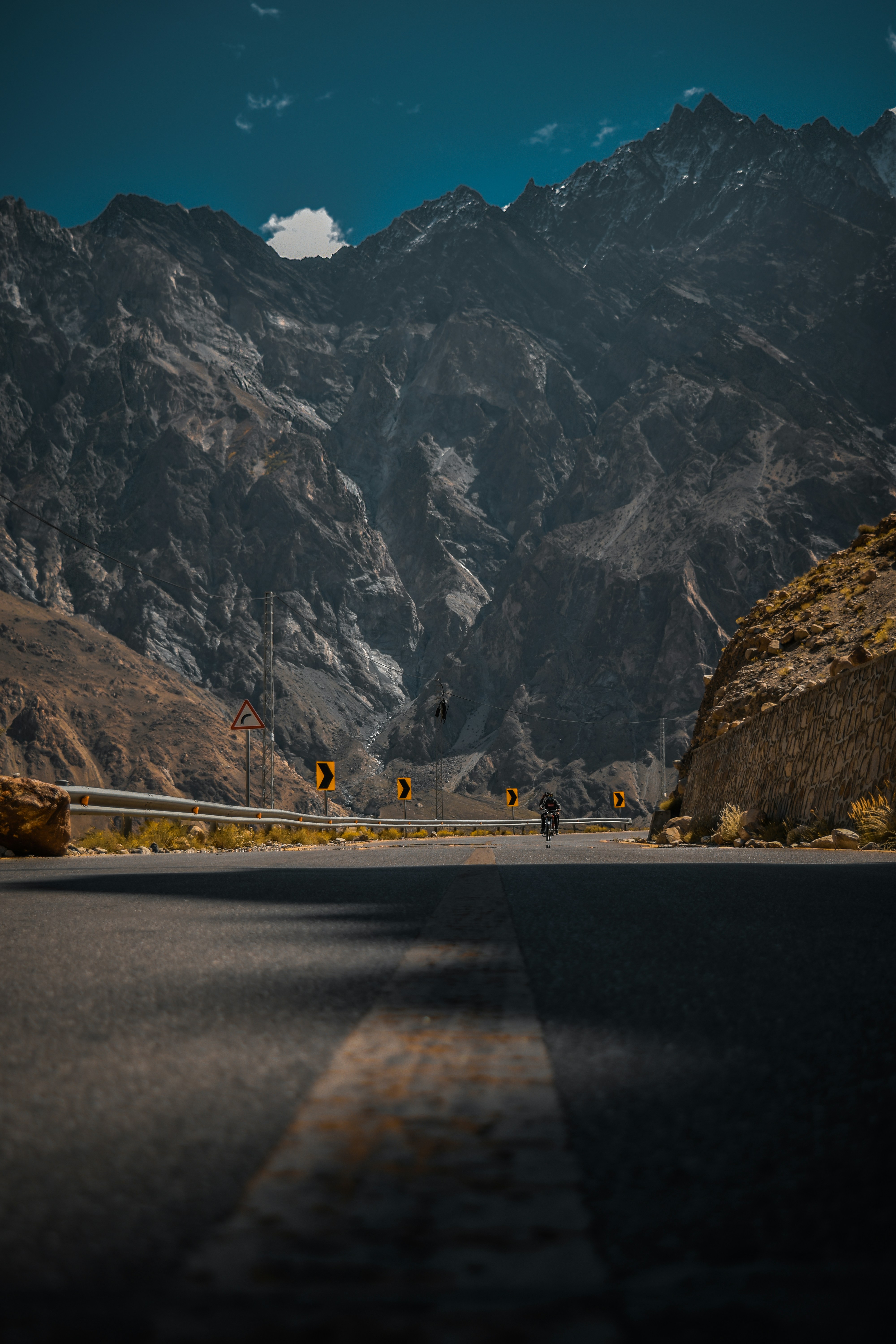 a view of a mountain range from a road