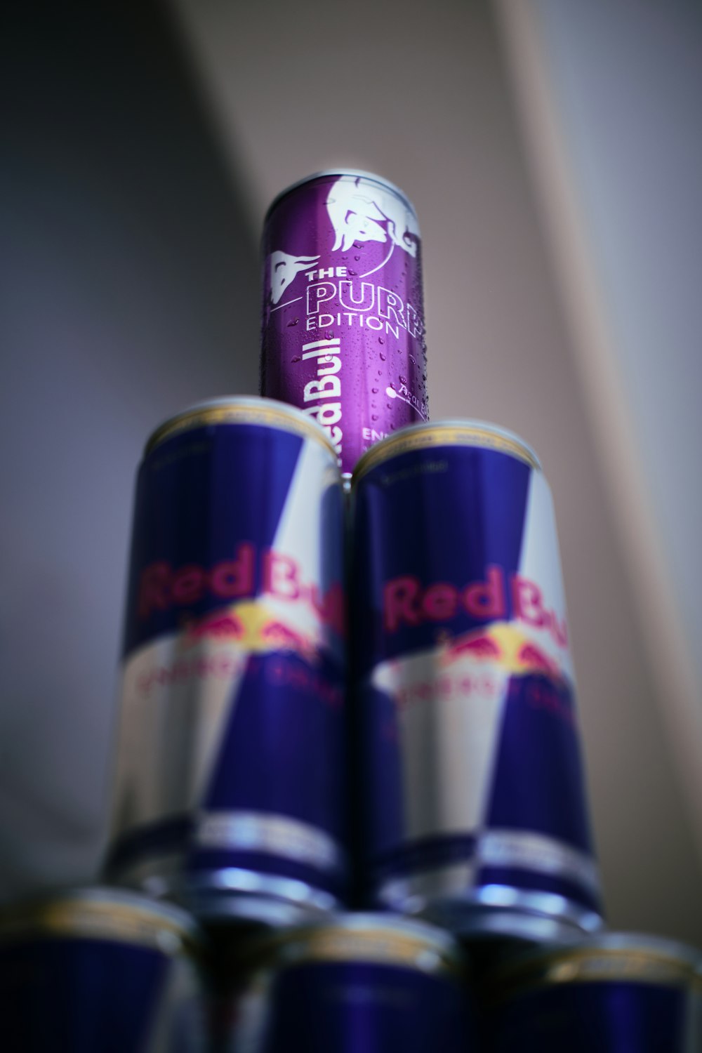 a stack of cans of red bull energy drink