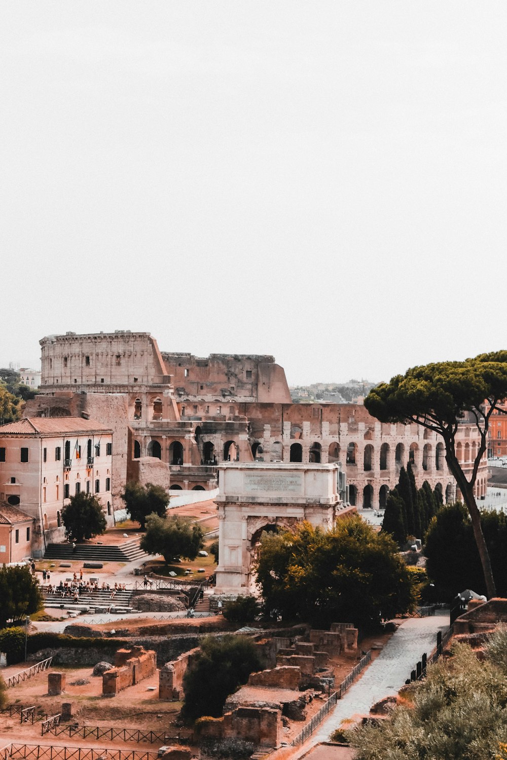 a view of a roman city from the top of a hill