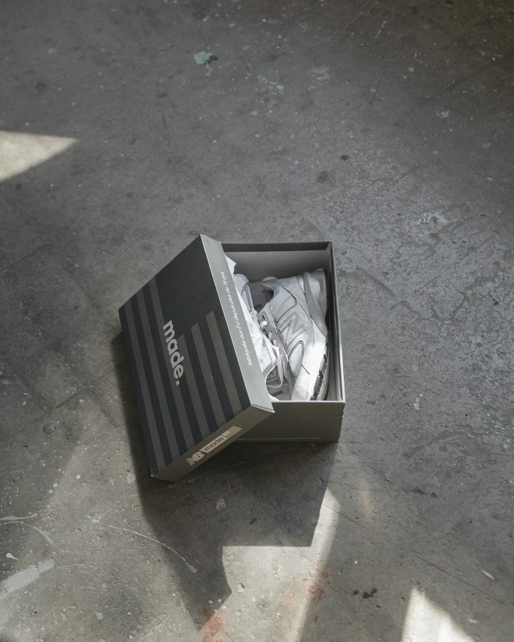 a box with a pair of shoes inside of it
