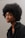 a woman with an afro is looking at the camera