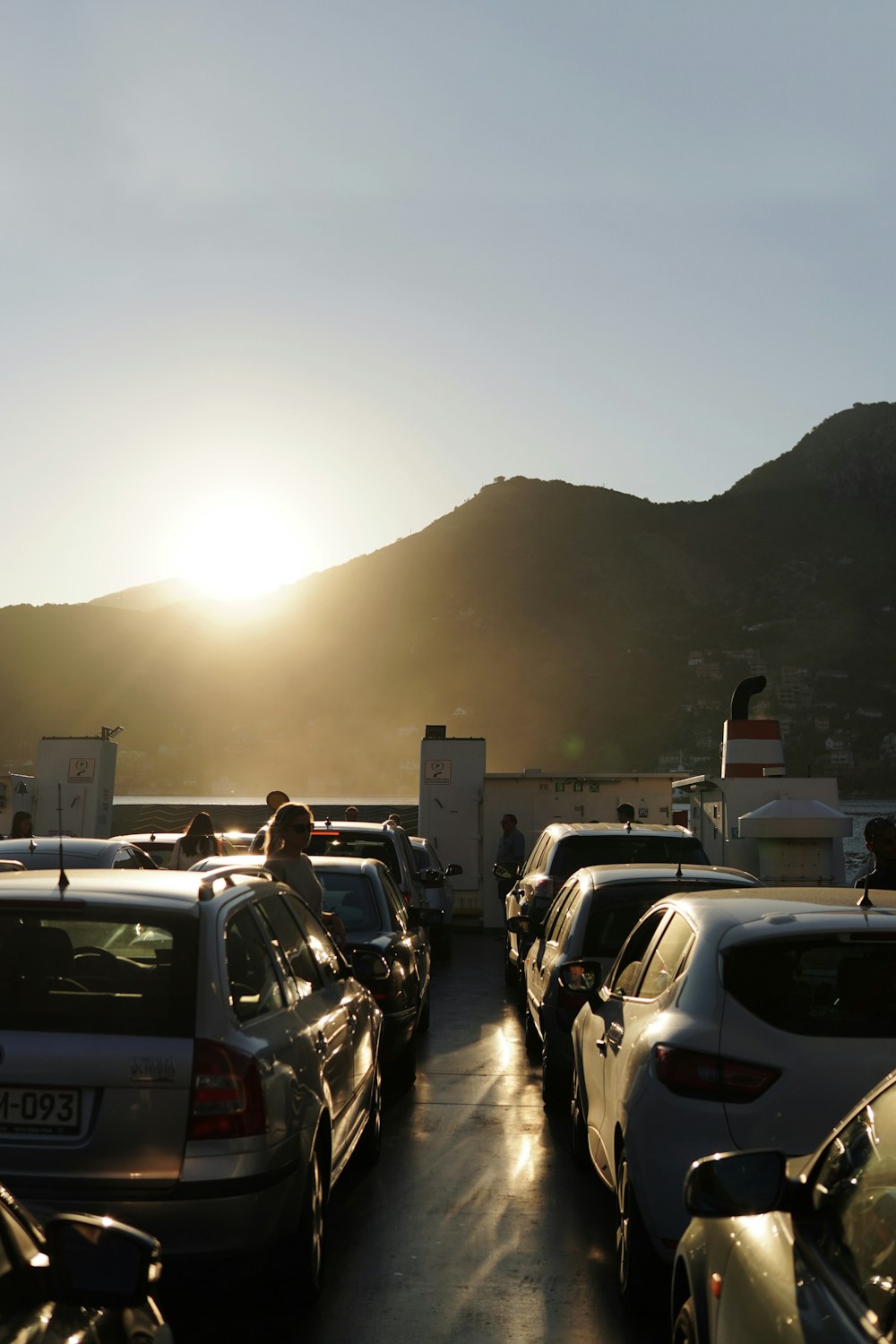 a parking lot filled with lots of parked cars