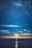 A serene night sky filled with stars and a glowing moon, evoking a sense of tranquility and inspiration.