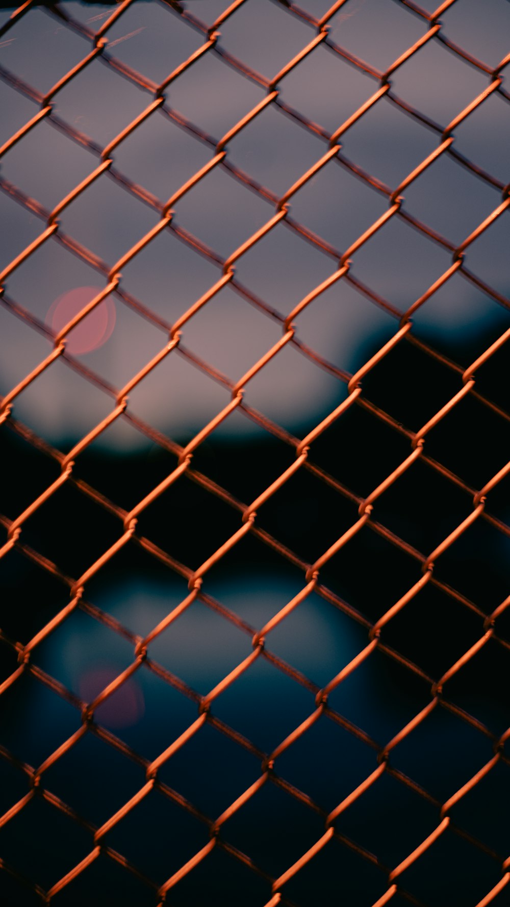 a close up of a chain link fence