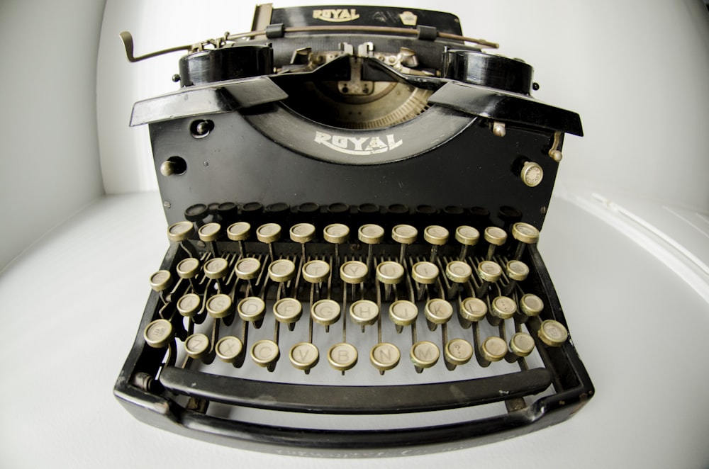 a close up of an old fashioned typewriter