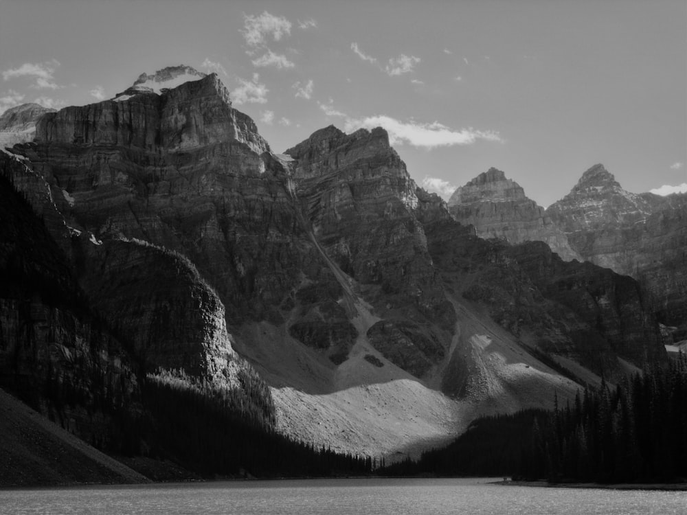 a black and white photo of a mountain range