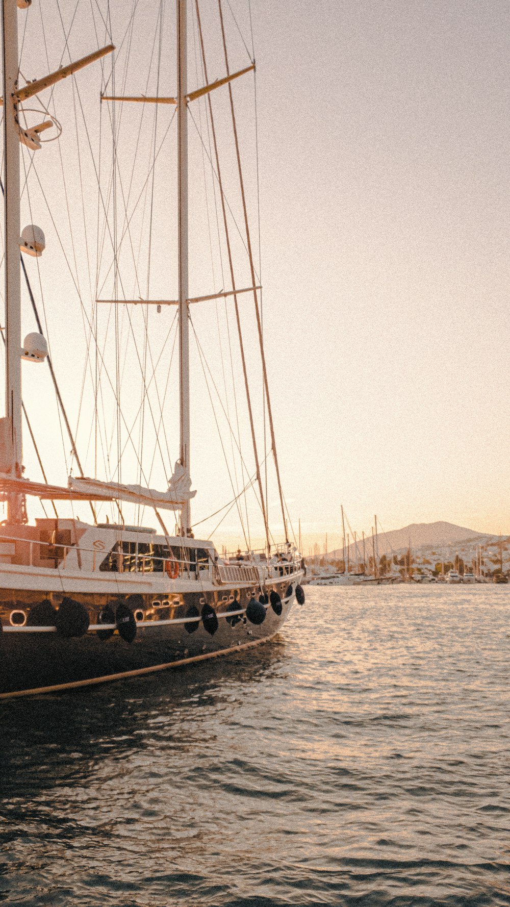 a large boat floating on top of a body of water