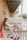 Happy woman relaxing on her porch with a Verdavibe delivery box beside her