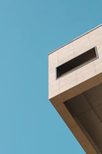 a building with a clock on the side of it