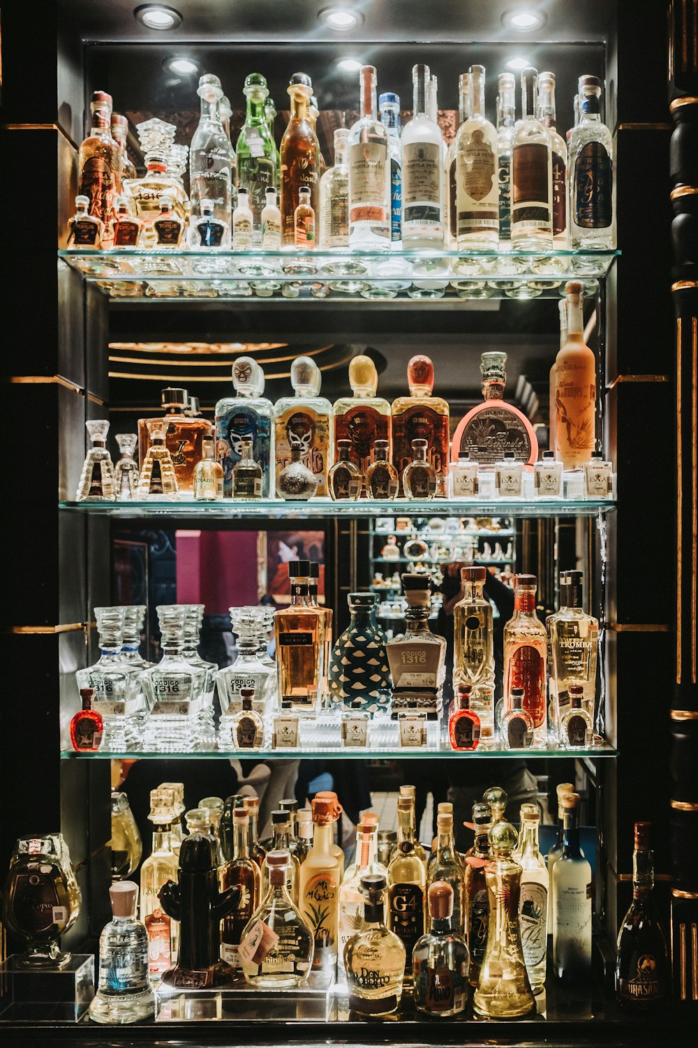 a display case filled with lots of bottles