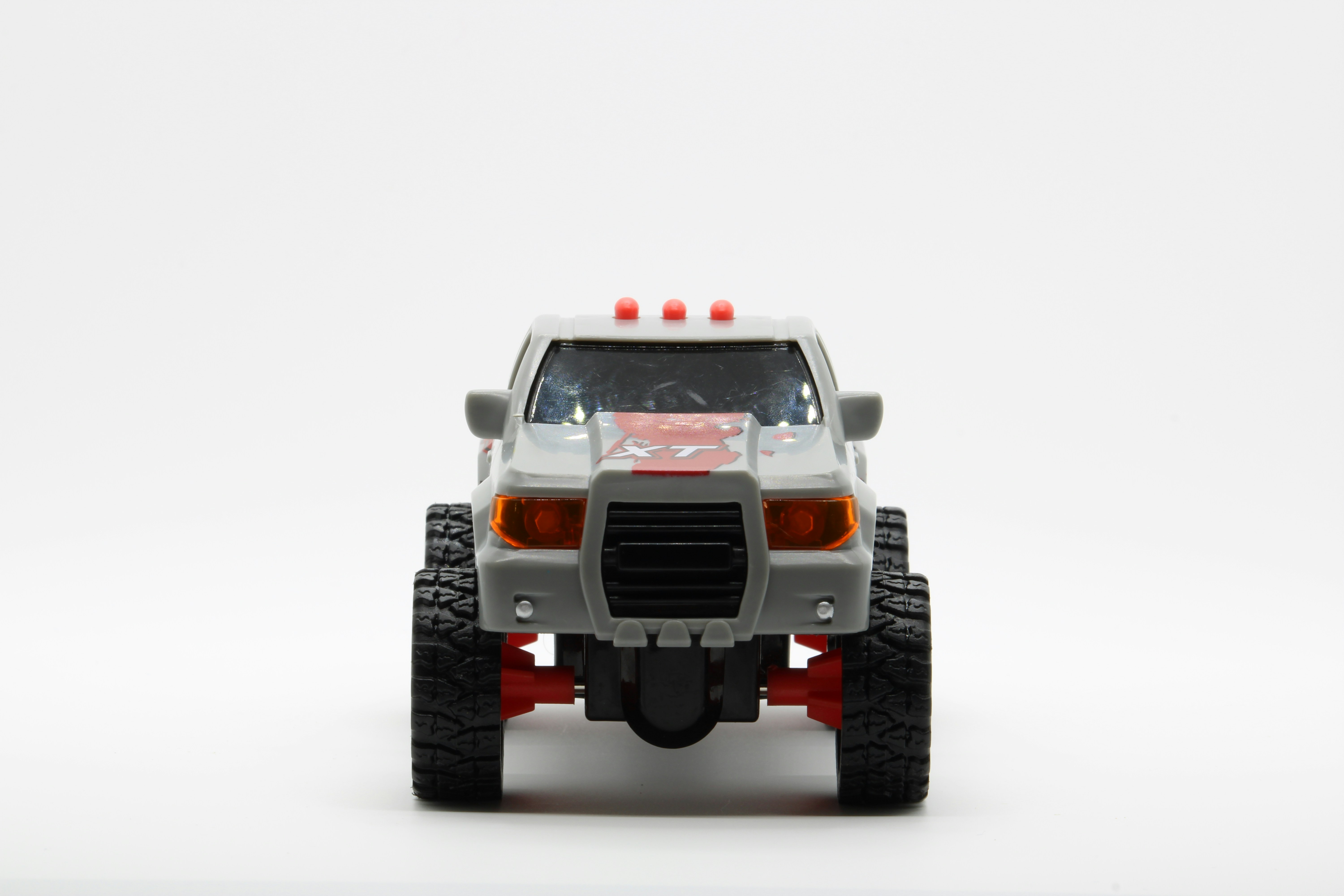 a toy truck is shown on a white background