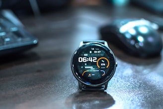 a close up of a smart watch on a table