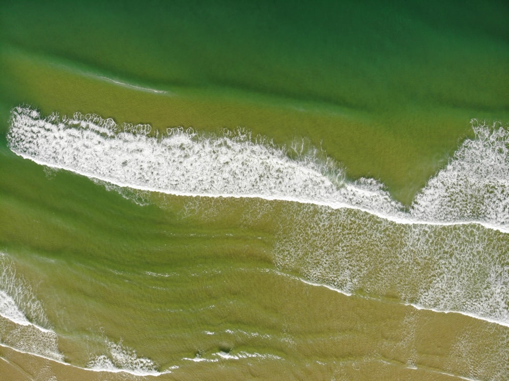 a bird's eye view of the ocean waves