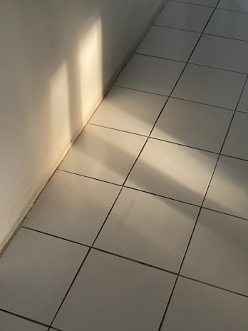 Modern Spanish floor ceramics displayed with natural light highlighting their texture.