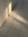 Close-up of a beautifully tiled kitchen floor with natural light highlighting the texture.
