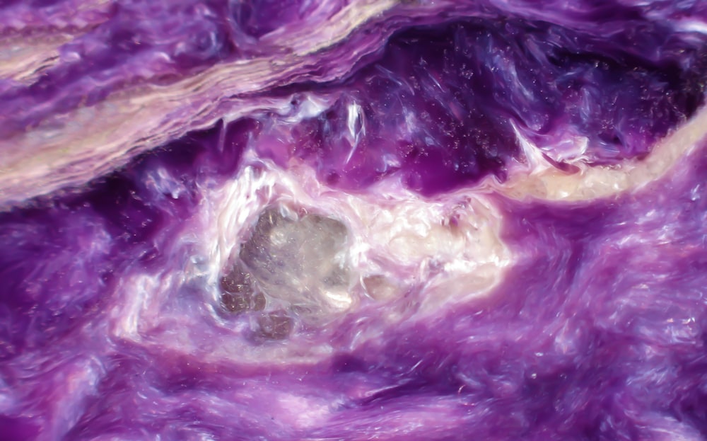 a close up view of a purple substance