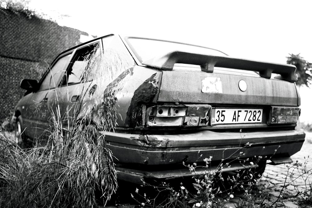 a car that is sitting in the grass