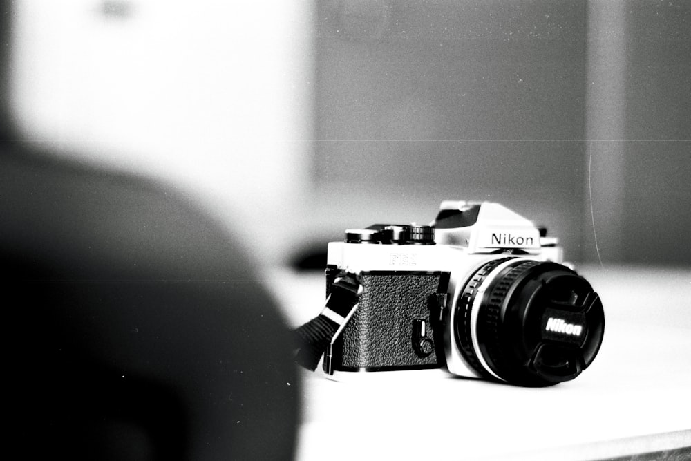 a black and white photo of a camera