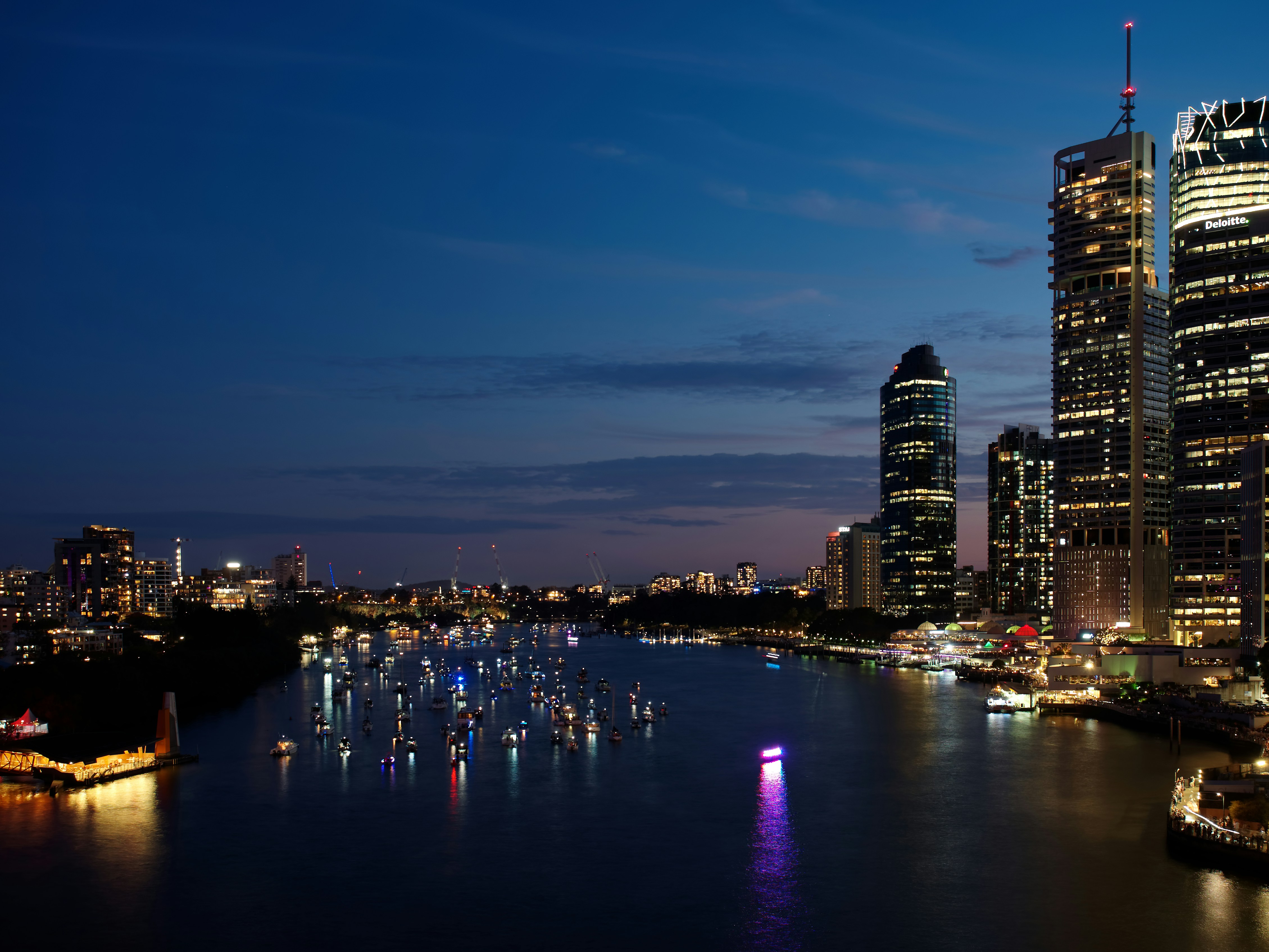 a view of a city at night from across the water