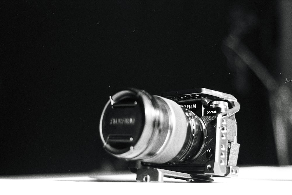 a black and white photo of a camera