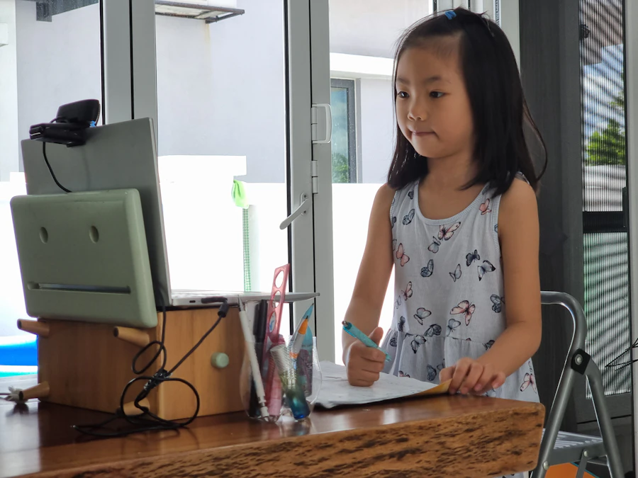 Child practising handwriting in a guided small-group lesson