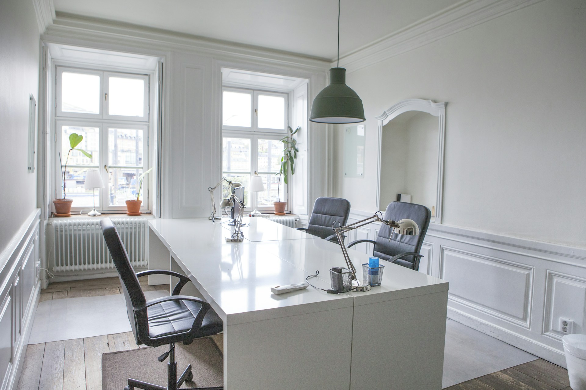 a kitchen with a large white counter top