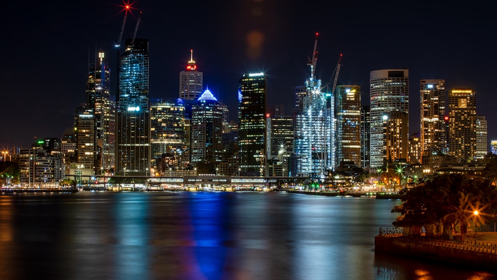 a night view of a city with a lot of tall buildings