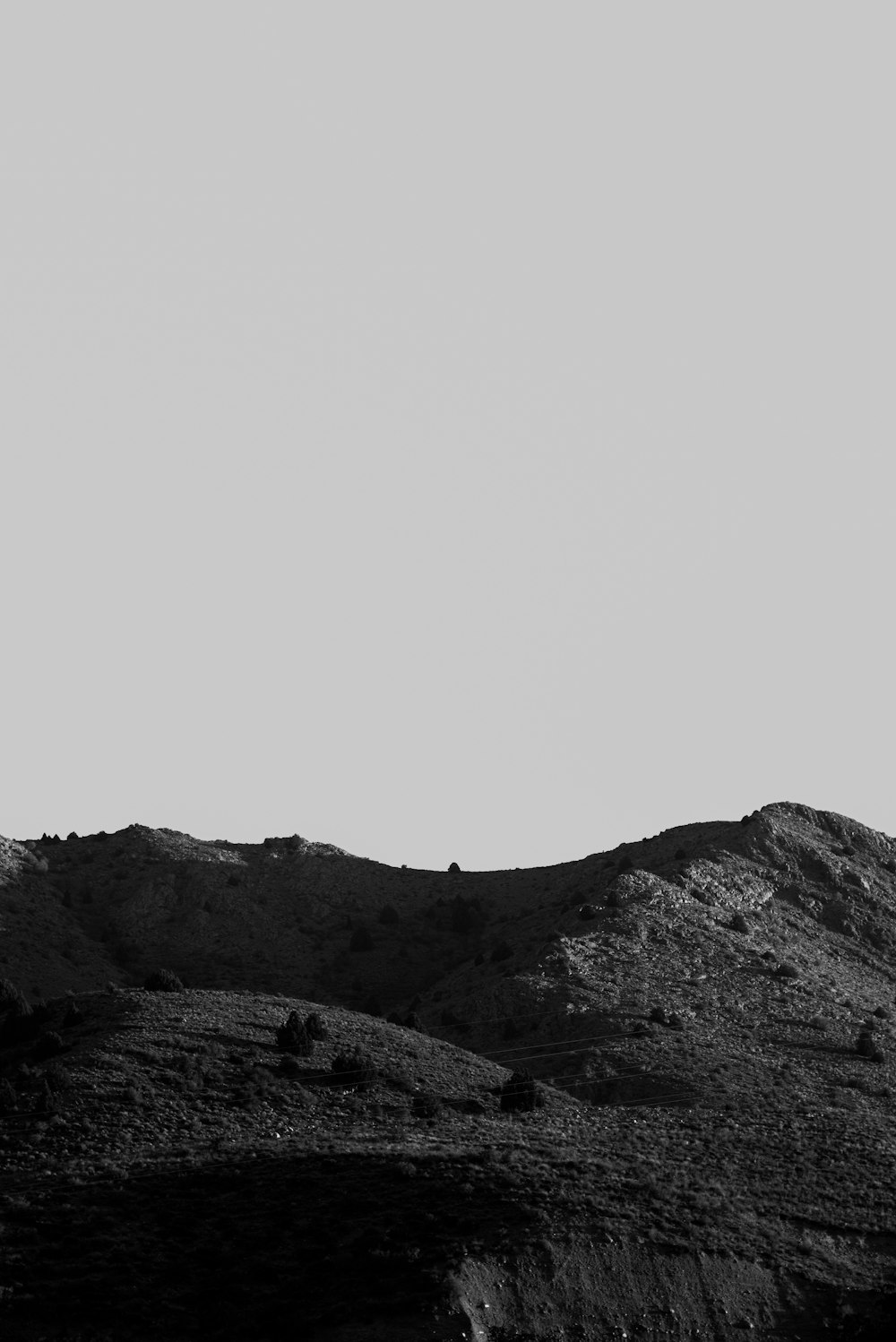 a black and white photo of a mountain