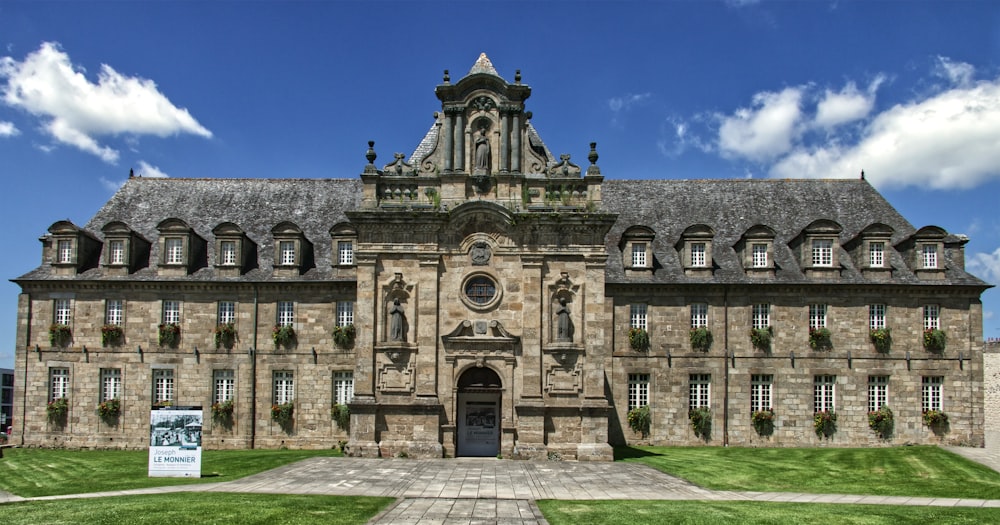 a large stone building with a clock tower