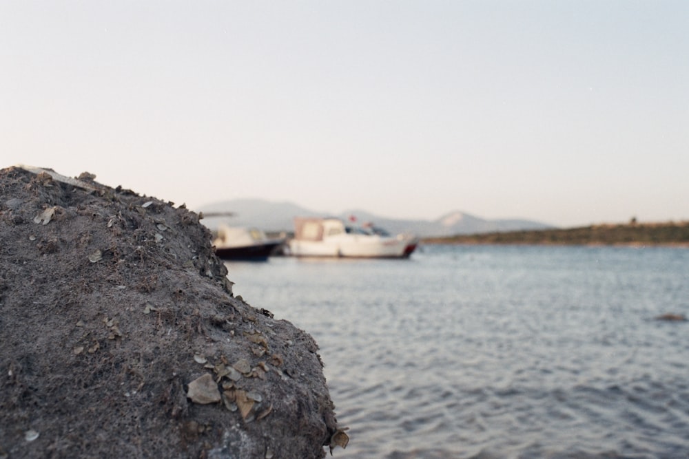 a view of a body of water with a boat in the distance