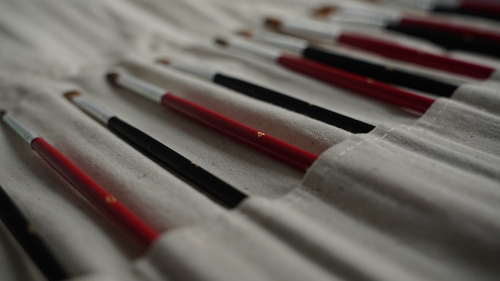 a close up of a number of brushes on a table